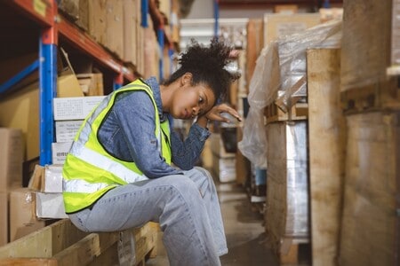 Tired,Stress,Woman,Worker,Labor,Working,In,Warehouse,Cargo,Inventory