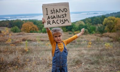 A Little Girl Standing Against Anti Racism