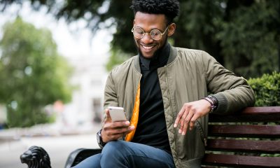 Man Sitting in a Bench