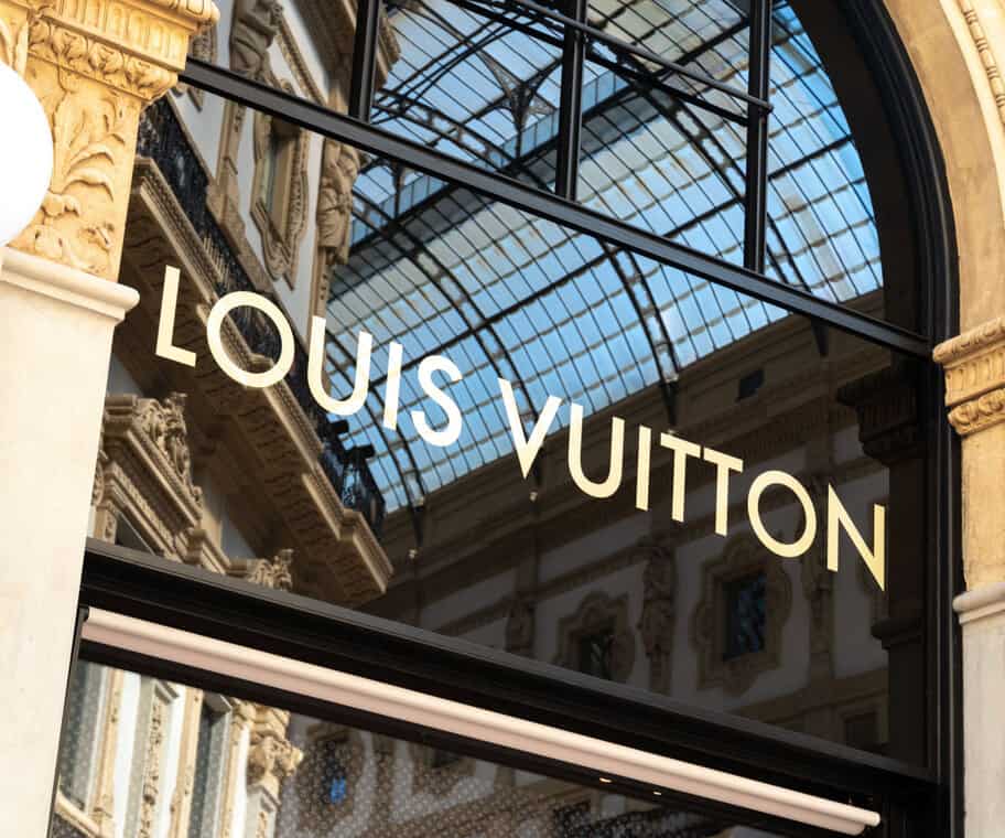 Louis Vuitton Logo - Louis Vuitton Icon on Brown Background