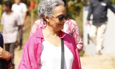 Arundhati Roy out walking on sunny day